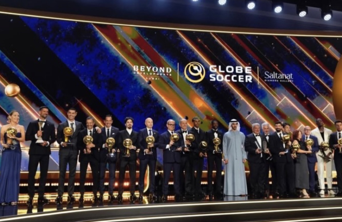 Awards stage with sponsor branding